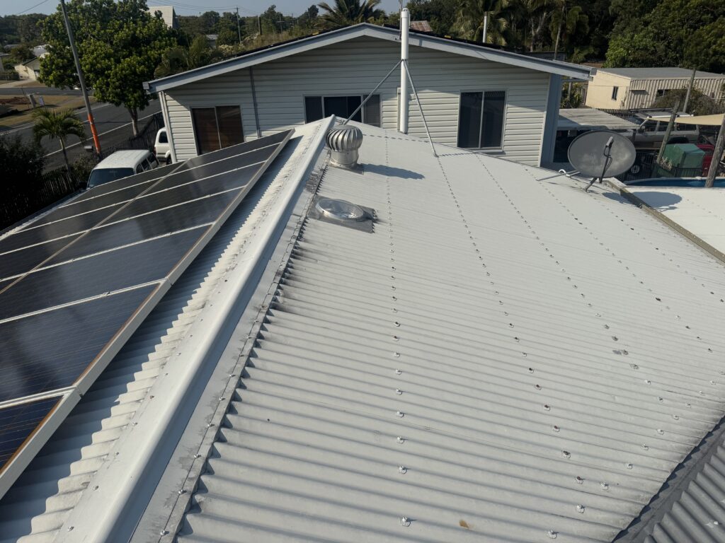 Roof cleaning Slade Point Colourbond roof with solar panels