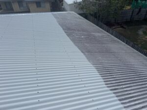 Before and after cleaning of a white Colorbond roof in Beaconsfield Mackay