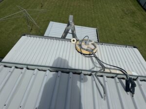 Professional roof cleaning equipment used on a South Mackay property