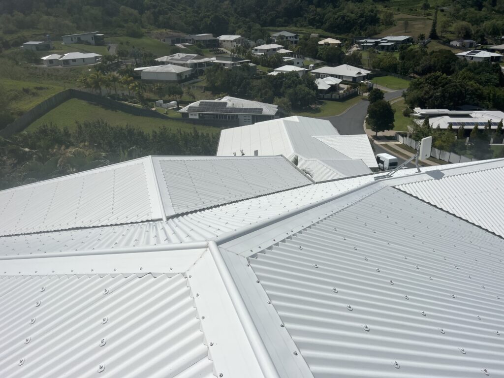 Wide aerial shot of the completed roof