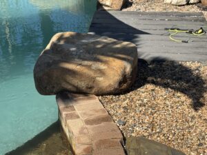  Close-up of a pressure-cleaned poolside rock in Mackay