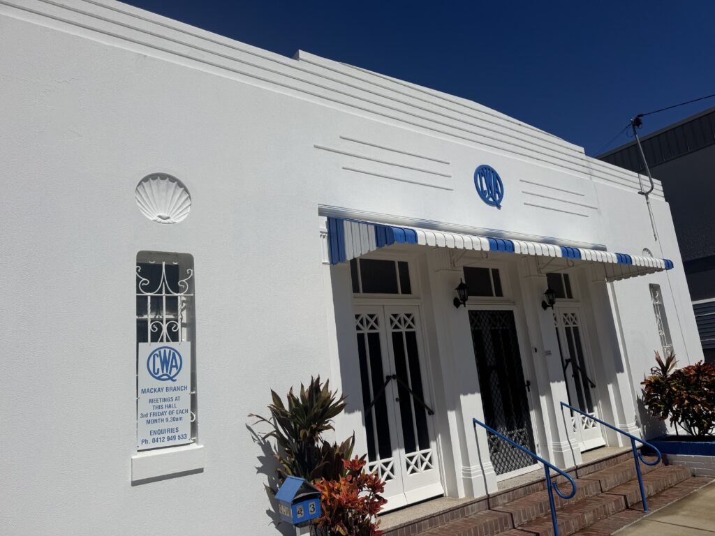 1. Clean white exterior walls and windows after commercial building washing in Mackay