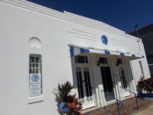 1. Clean white exterior walls and windows after commercial building washing in Mackay
