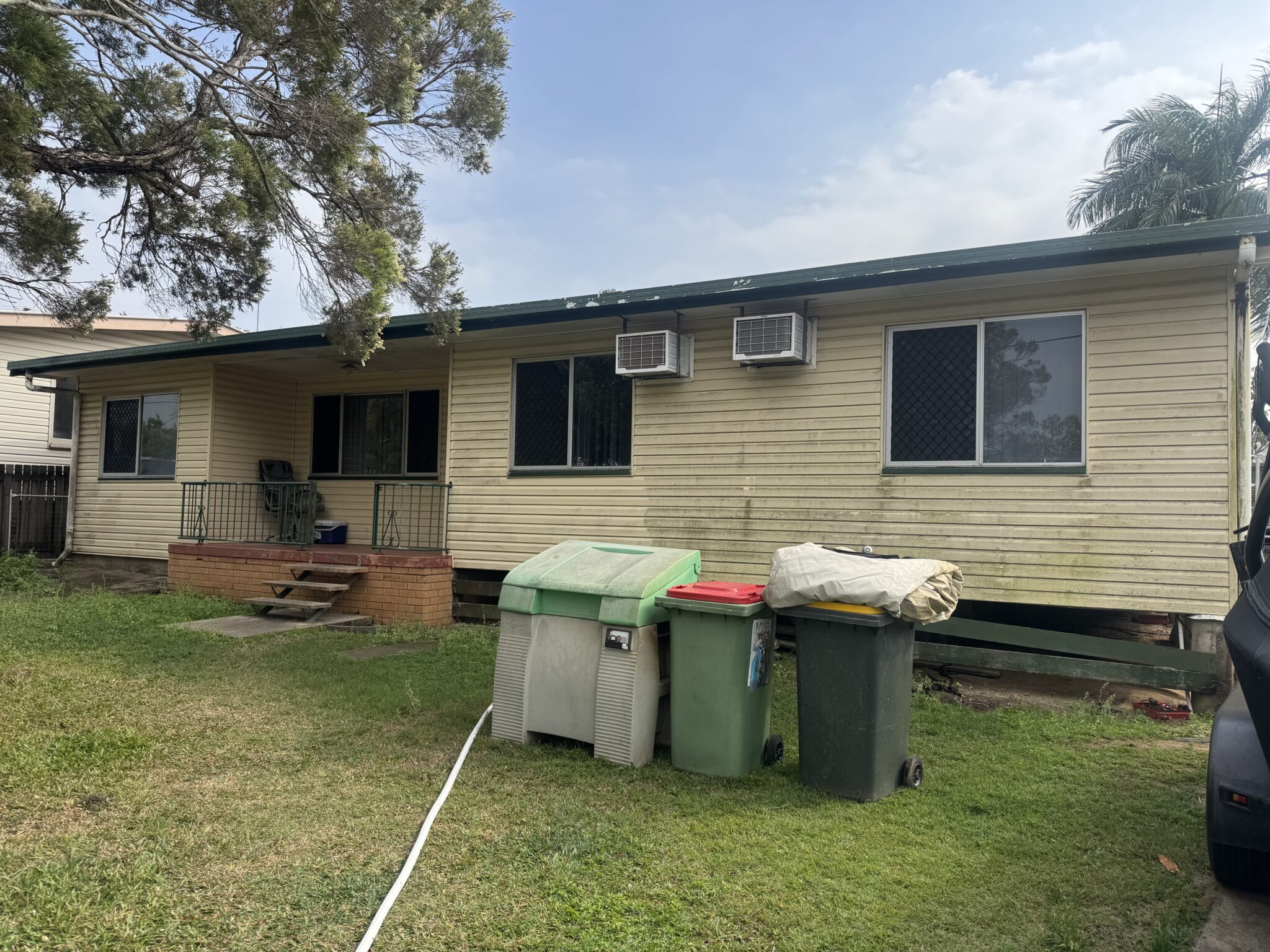North Mackay home's exterior walls and windows during a house-washing project