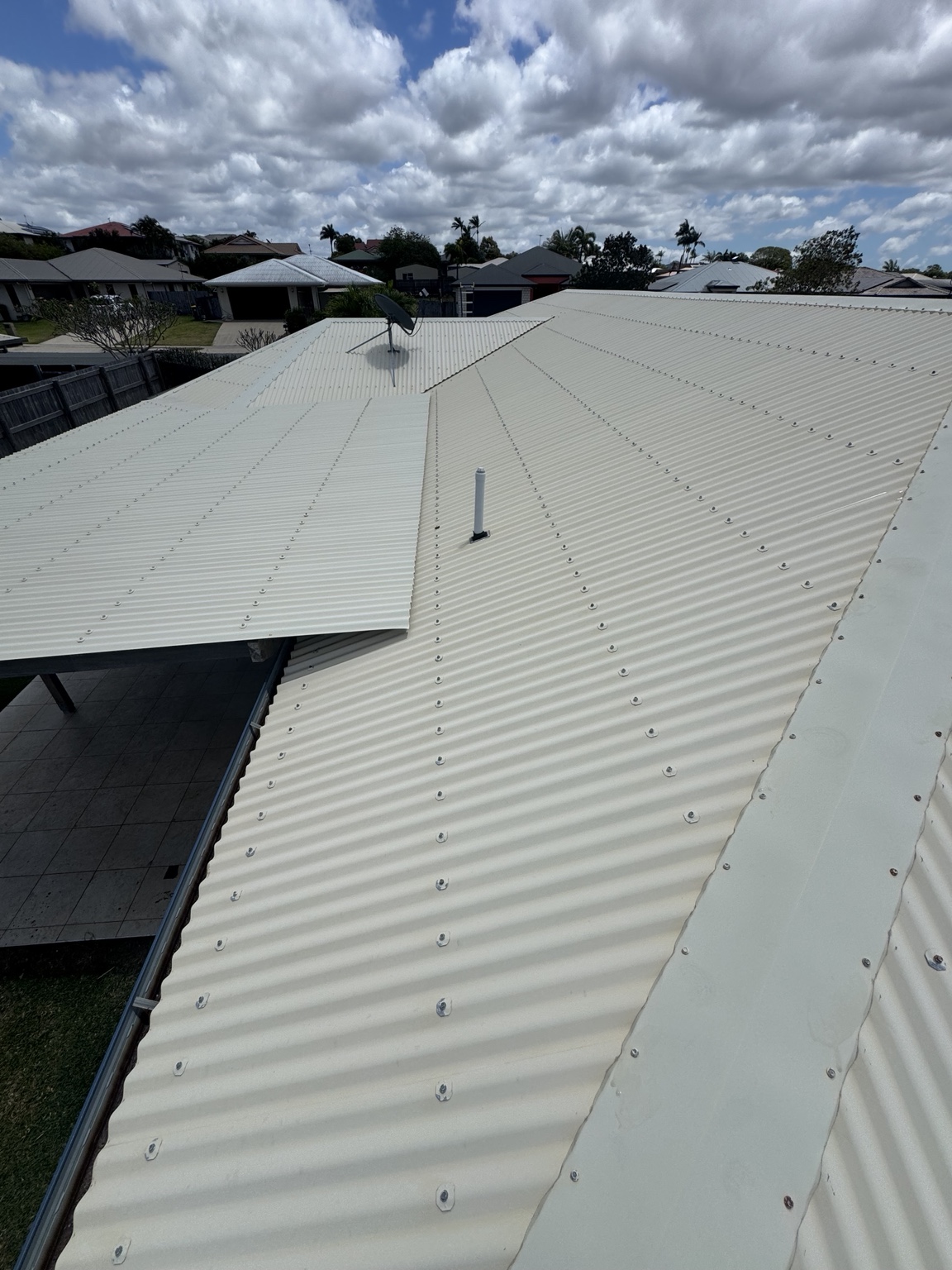 Light-coloured roof after corrugated roof cleaning in Walkerston